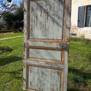 Porte ancienne en bois patiné